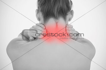 Woman touching highlighted neck pain