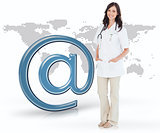 Nurse standing by digital email at symbol
