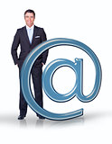 Businessman standing with email at symbol