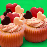 Close up of three valentines cupcakes