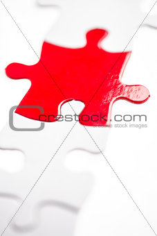 Red jigsaw piece