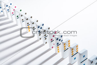 Line of colourful dominoes