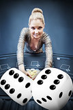 Blonde woman grabbing chips with digital dice