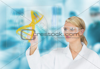 Doctor consulting DNA helix diagram on touchscreen display