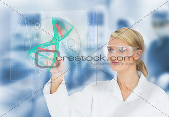 Doctor using touchscreen displaying DNA helix diagram