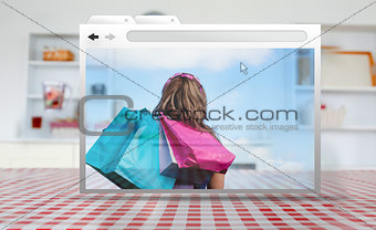 Digital internet window showing girl with shopping bags