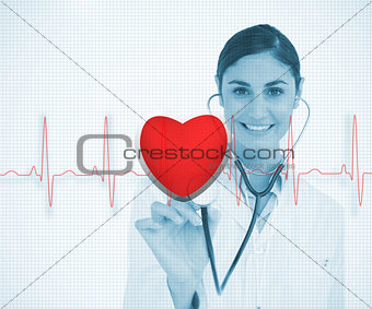 Doctor holding stethoscope up to red ECG line with heart graphic