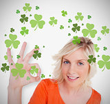Blonde giving ok symbol for st patricks day and smiling
