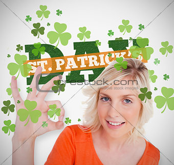 Blonde giving ok symbol for st patricks day with text and shamrocks