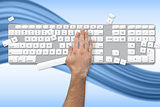 Hand breaking white and grey keyboard