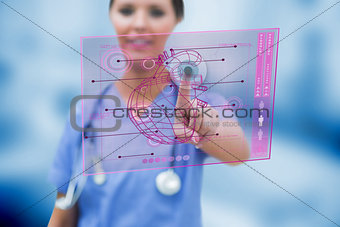 Cardiologist touching a medical interface