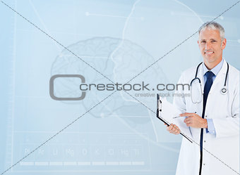 Portrait of senior doctor using a clipboard