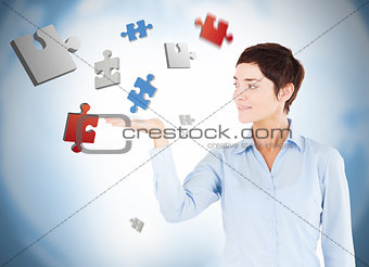 Well dressed woman with puzzles levitating