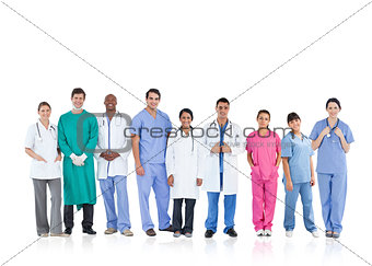 Happy medical team standing in line