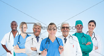 Medical team standing in line on blue background