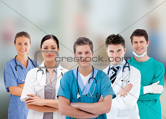 Smiling hospital workers standing in line