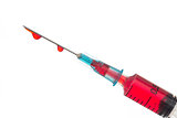 Syringe dripping blood