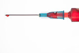 Drop of blood on end of syringe