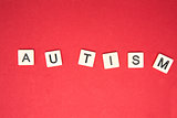 Autism spelled out in letter pieces