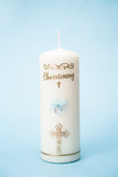 Christening candle for a boy with blue detail