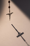 Crucifix casting a shadow