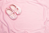 Pink blanket and baby slippers