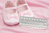 Contraceptive pill packet with baby booties