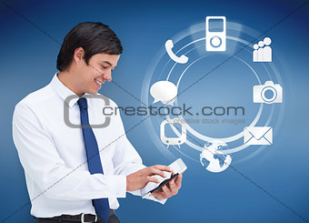 Businessman using tablet with applications