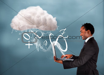 Businessman using laptop to connect to cloud computing