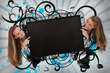 Girls pointing to black copy space on cursive design background