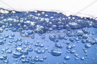 Close up on water with bubbles