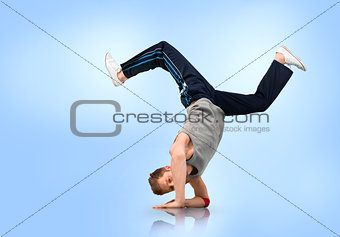 Break dancer balancing on his forearms