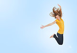 Pretty young woman jumping for joy