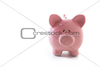 Ceramic pink piggy bank with copy space