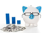 Piggy bank wearing glasses with dollars and blue graph model