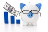 Piggy bank wearing glasses with blue graph model