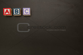 Wooden blocks spelling out abc
