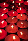Red candles lighting up the dark