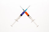 Two syringes crossing