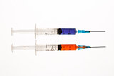 Two syringes beside each other