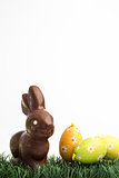 Chocolate bunny rabbit and two easter eggs