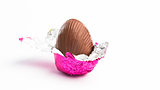 Easter egg unwrapped in pink foil