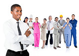 Businessman in shirt standing in front of different types of workers