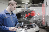 Mechanic using tablet and futuristic interface