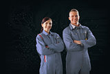 Mechanics standing in front of a circuit board background