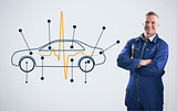 Mechanic standing in front of a background with car diagram