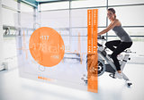 Young girl doing exercise bike with futuristic interface showing calories