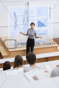 Teacher in front of futuristic interface asking a question