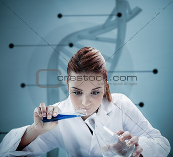 Blonde scientist pouring liquid into erlenmeyer in front of futuristic interface