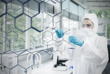 Chemist in protective suit working with futuristic interface with formula diagram